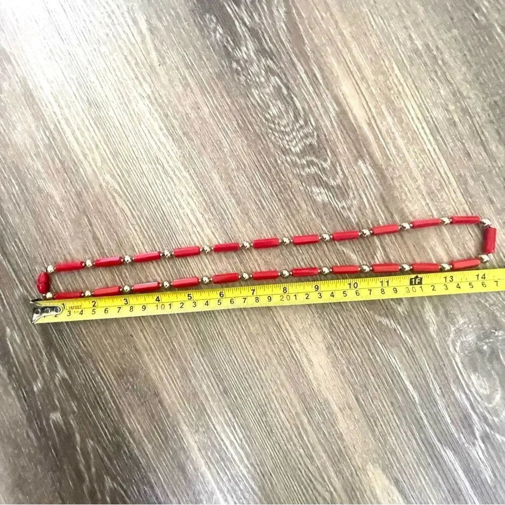 Red and gold tone beaded necklace